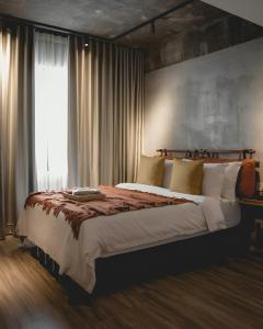 Postel nebo postele na pokoji v ubytování Hotel Mokozoyo