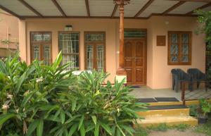 Um jardim no exterior de Tamarind Tree Masinagudi