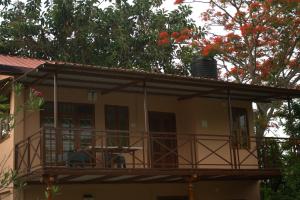 Uma varanda ou terraço em Tamarind Tree Masinagudi