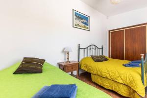 Ένα ή περισσότερα κρεβάτια σε δωμάτιο στο Maison A Quinta V2B 7 Personnes