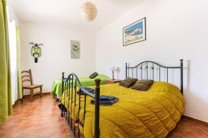 Ένα ή περισσότερα κρεβάτια σε δωμάτιο στο Maison A Quinta V2B 7 Personnes