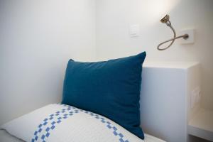 Кровать или кровати в номере Byzantio Beach Suites & Wellness