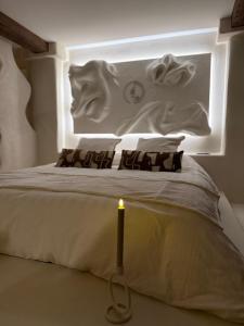 Postel nebo postele na pokoji v ubytování L Ode