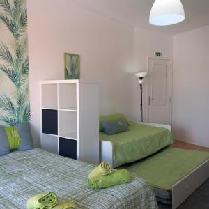 Ένα ή περισσότερα κρεβάτια σε δωμάτιο στο Lila's House
