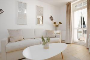 Ein Sitzbereich in der Unterkunft Villa Eden Binz Typ 3 / Apartment 12
