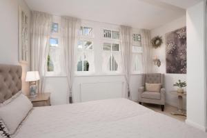 Ein Bett oder Betten in einem Zimmer der Unterkunft Villa Eden Binz Typ 3 / Apartment 12