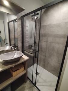 a bathroom with a glass shower and a sink at A l'Orée du Bois - Family - Entre lacs et montagnes in Séchilienne +23 photos