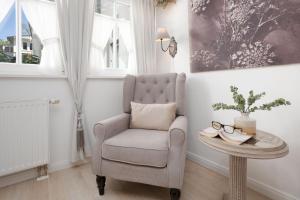 Ein Sitzbereich in der Unterkunft Villa Eden Binz Typ 3 / Apartment 12