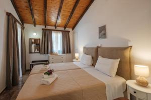 Posteľ alebo postele v izbe v ubytovaní Kalamionas Studios & Apartments