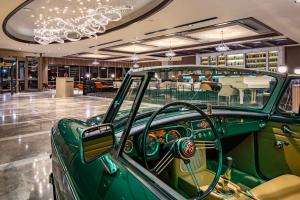 a green car parked inside of a store at Grand Harilton Otel in Istanbul