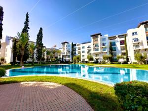 Bazén v ubytování Marina Agadir by Home box nebo v jeho okolí