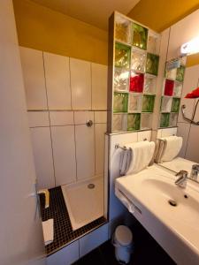 Postel nebo postele na pokoji v ubytování Arche Hotel