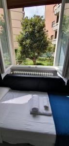 A bed or beds in a room at Appartamenti Reali Bonaccini