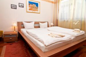 Postel nebo postele na pokoji v ubytování Hotel Kugel
