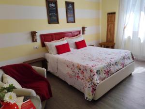 Postel nebo postele na pokoji v ubytování La Bicicletta Rooms