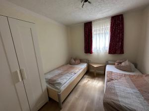 Ένα ή περισσότερα κρεβάτια σε δωμάτιο στο Wohnung B2
