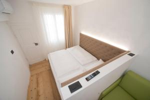 Postel nebo postele na pokoji v ubytování Residence Fink Central Apartments