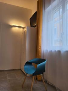 TV a/nebo společenská místnost v ubytování Borgo di Levante luxury apartments