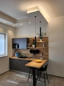 Kuchyň nebo kuchyňský kout v ubytování Borgo di Levante luxury apartments