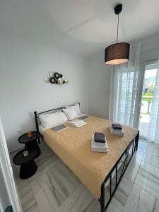 Una cama o camas en una habitación de OpenSeaMasainette2