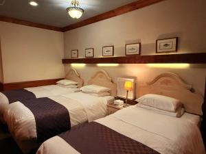 Postel nebo postele na pokoji v ubytování Hotel Gasthof