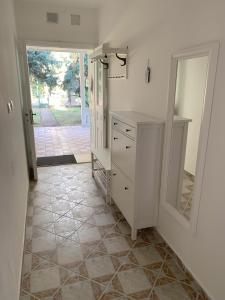 Kuchyň nebo kuchyňský kout v ubytování Platan Apartman