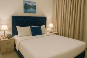Una cama o camas en una habitación de Saraya Palace Hotel