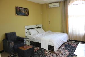 Clock Tower Hotel客房内的一张或多张床位