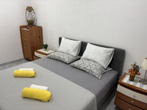 Postel nebo postele na pokoji v ubytování Apartman Jasmina