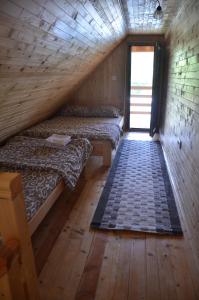 Ένα ή περισσότερα κρεβάτια σε δωμάτιο στο Negde na Drini 4