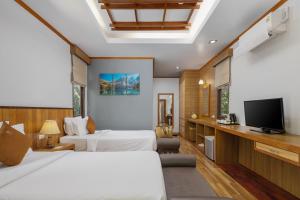 TV a/nebo společenská místnost v ubytování Phangan Bayshore Resort Koh Phangan