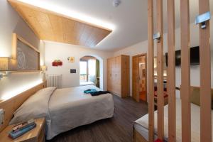 Кровать или кровати в номере Hotel Bel Soggiorno