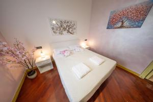 Letto o letti in una camera di Villa Sun Kiss