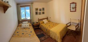 Postel nebo postele na pokoji v ubytování Casa do Mar