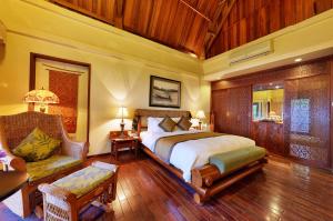Ein Bett oder Betten in einem Zimmer der Unterkunft Sun Spa Resort & Villa