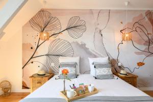 Postel nebo postele na pokoji v ubytování Les 13 lavoirs d'antan - chambre zen attitude