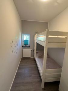 Una cama o camas en una habitación de Ferienwohnung Sühling