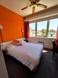 Postel nebo postele na pokoji v ubytování Arche Hotel
