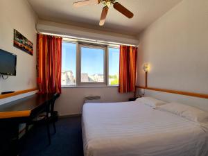 Postel nebo postele na pokoji v ubytování Arche Hotel + 37 fotografií