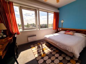 Postel nebo postele na pokoji v ubytování Arche Hotel