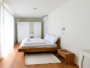 En eller flere senge i et værelse på Villa Maria + 21 billeder