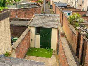 an overhead view of a building with a green door at Workington Haven - 3 Bed Home in Workington