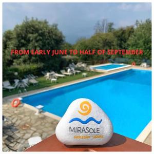 a picture of a pool with aitatingitatingitatingitatingitatingitatingitatingitatingitating at Mirasole Holiday House in Leggiuno