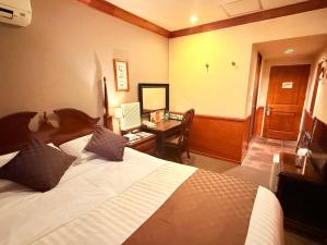 Postel nebo postele na pokoji v ubytování Hotel Gasthof