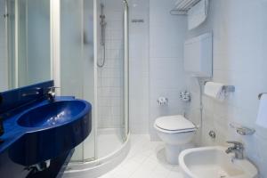 Koupelna v ubytování Hotel Oriente + 37 fotografií