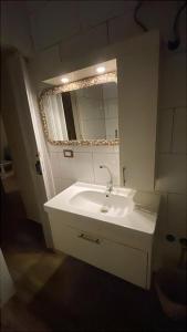 a bathroom with a white sink and a mirror at Sage House Lighthouse & Assalah in Dahab +71 photos