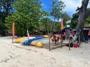 a large water slide on the sand on a beach at Fauna Beach Chalet Pulau Perhentian in Perhentian Islands