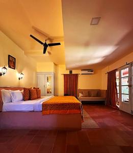 Postel nebo postele na pokoji v ubytování Marari Dreamz Homestay