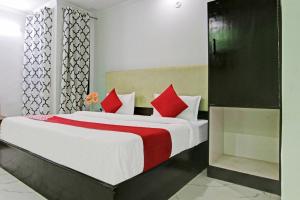 Postel nebo postele na pokoji v ubytování Hotel O Downtown