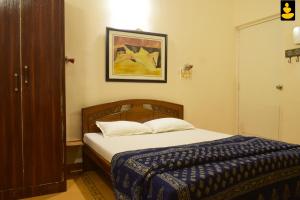 3BHK Riverside Stay Reflektions by LivingStone客房内的一张或多张床位